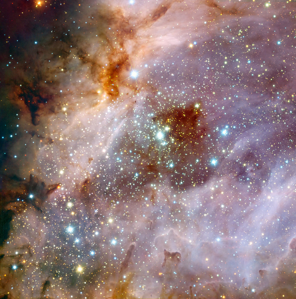 omega nebula stars,stellar nursery